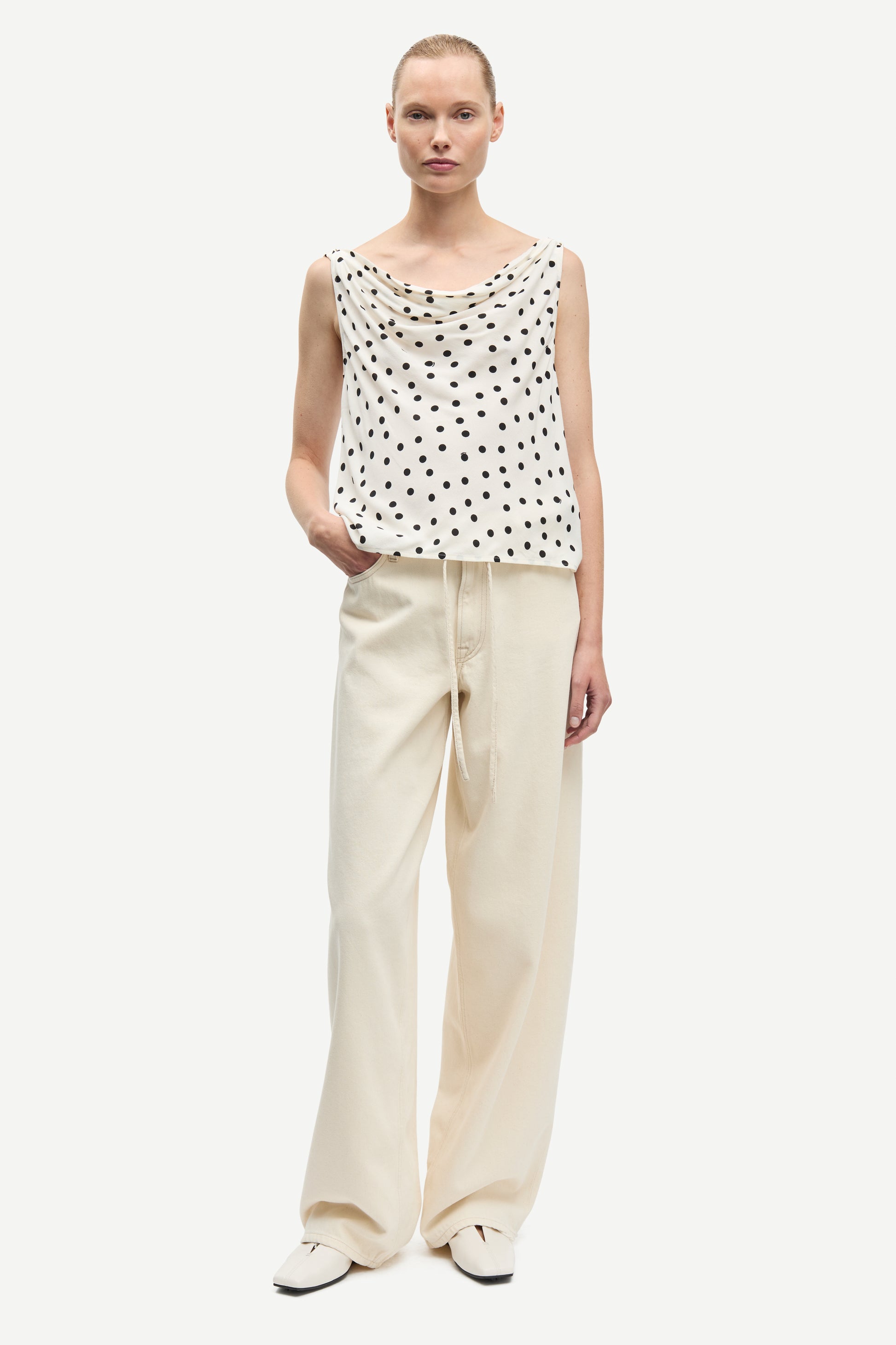 white cowl neck polka dot sleeveless top from samsoe model shot