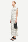 polka dot white mid length dress with cap sleeves and round neck from samsoe  side 