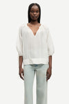 round neck 3/4 sleeve off white blouse with v neck and drawstring cuffs from samsoe model shot