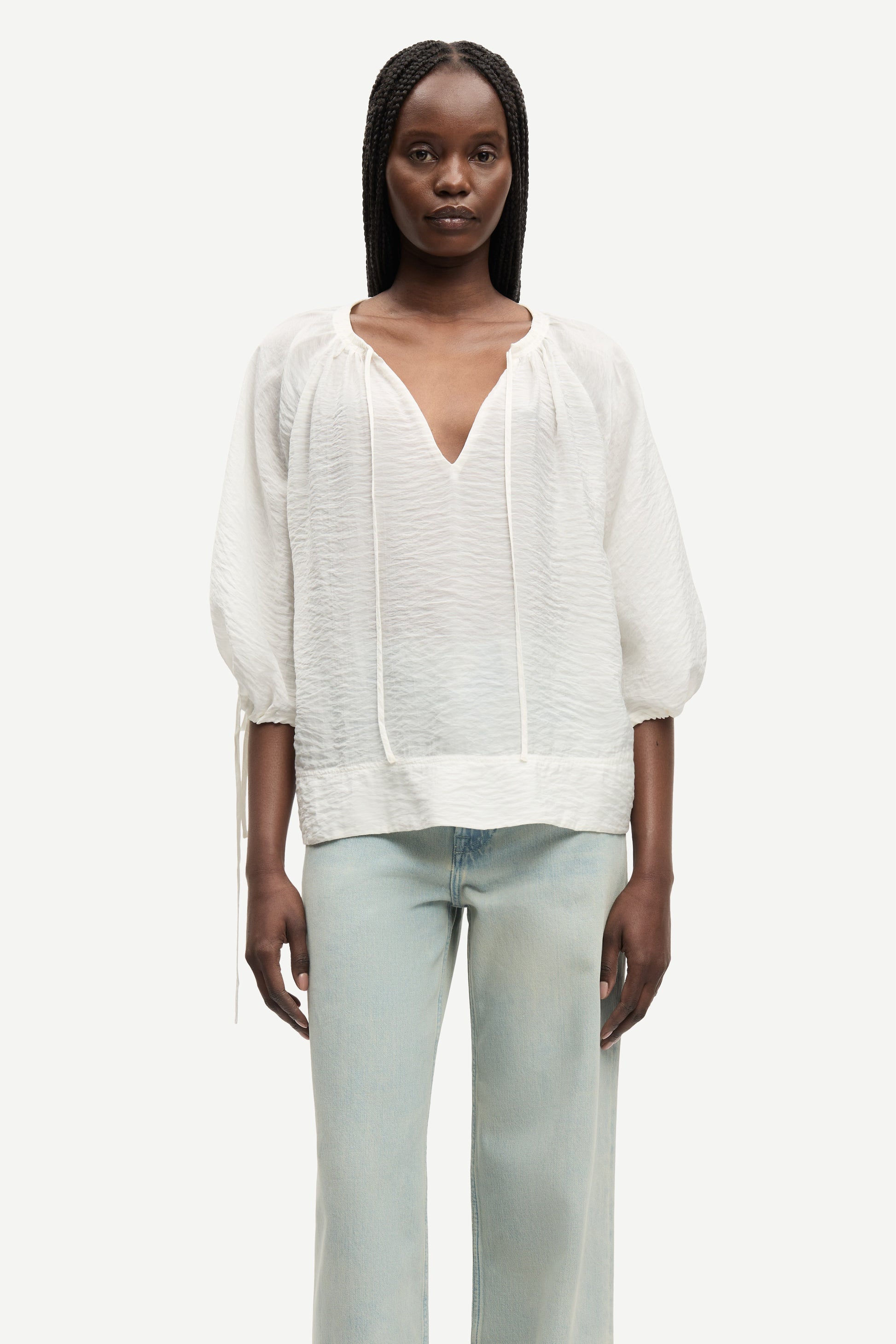round neck 3/4 sleeve off white blouse with v neck and drawstring cuffs from samsoe model shot