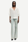 round neck 3/4 sleeve off white blouse with v neck and drawstring cuffs from samsoe model shot