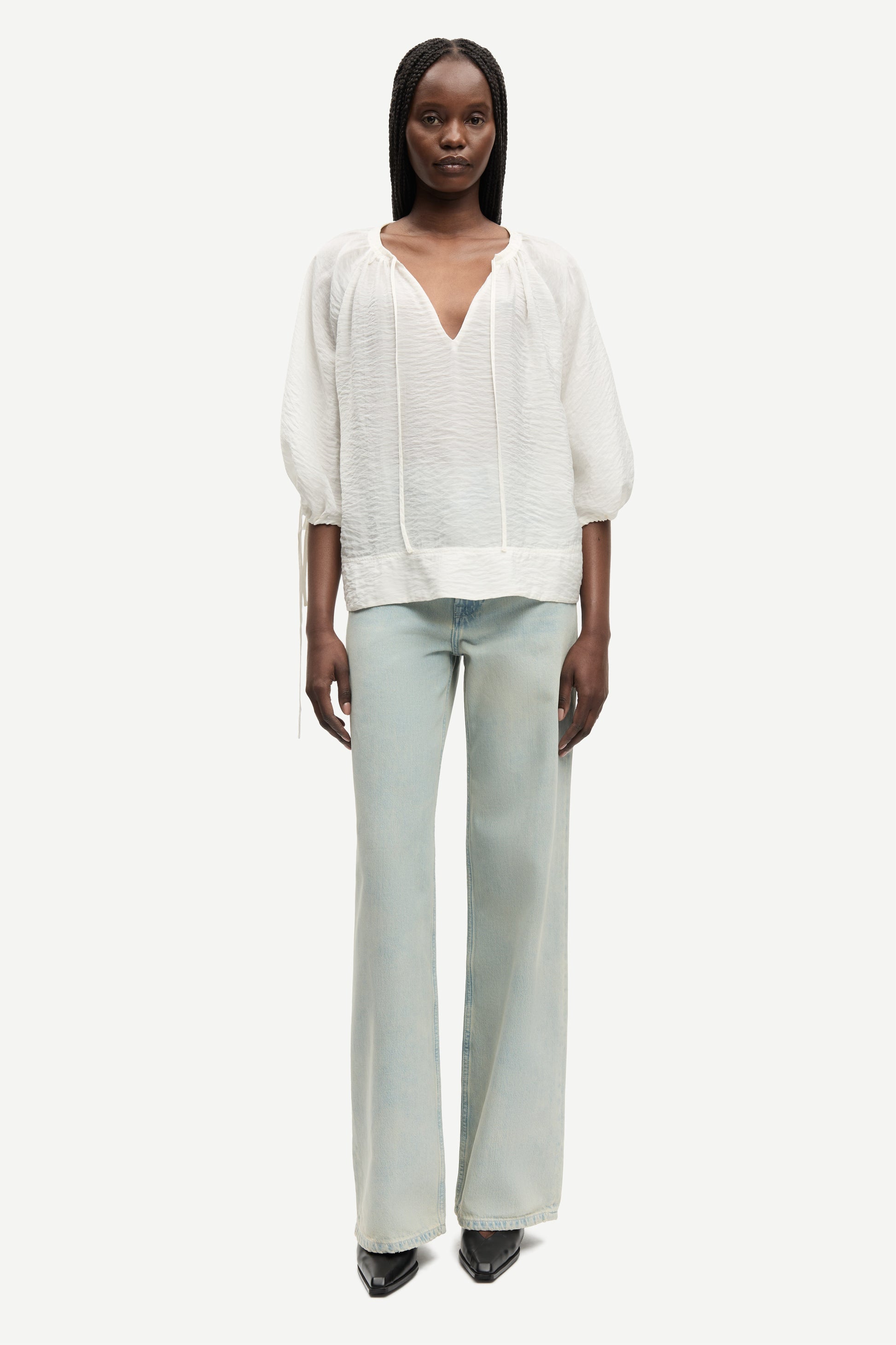 round neck 3/4 sleeve off white blouse with v neck and drawstring cuffs from samsoe model shot