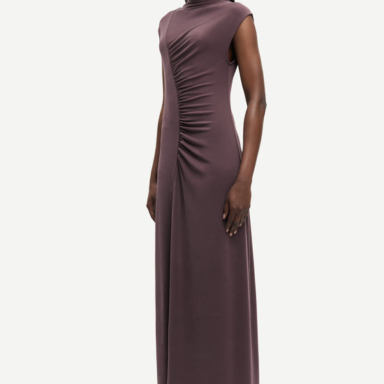 high neck cap sleeves stretchy maxi length rouched burgundy dress from samsoe model shot