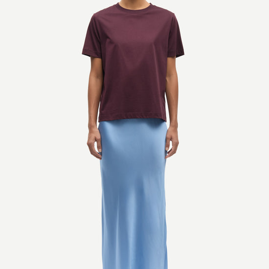 mid length elasticated waist slip skirt in light blue from samsoe model shot