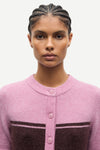 round neck short sleeve pink cardigan with burgundy stripe across the chest from samsoe model shot
