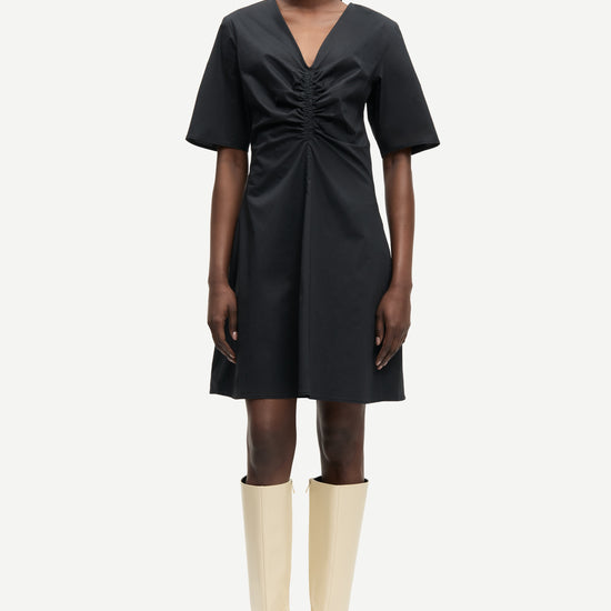 v neck short sleeve black short dress with rouch detailing from samsoe model shot