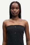 strapless mid length black dress with button down and a line shape from samsoe close up