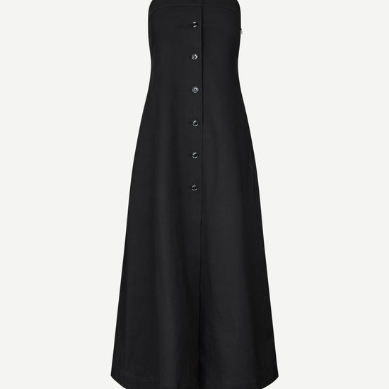 strapless mid length black dress with button down and a line shape from samsoe