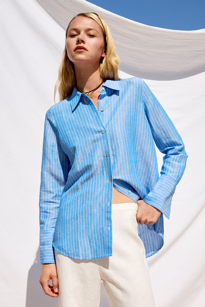 blue pinstripe linen shirt with shiny buttons from rails model shot