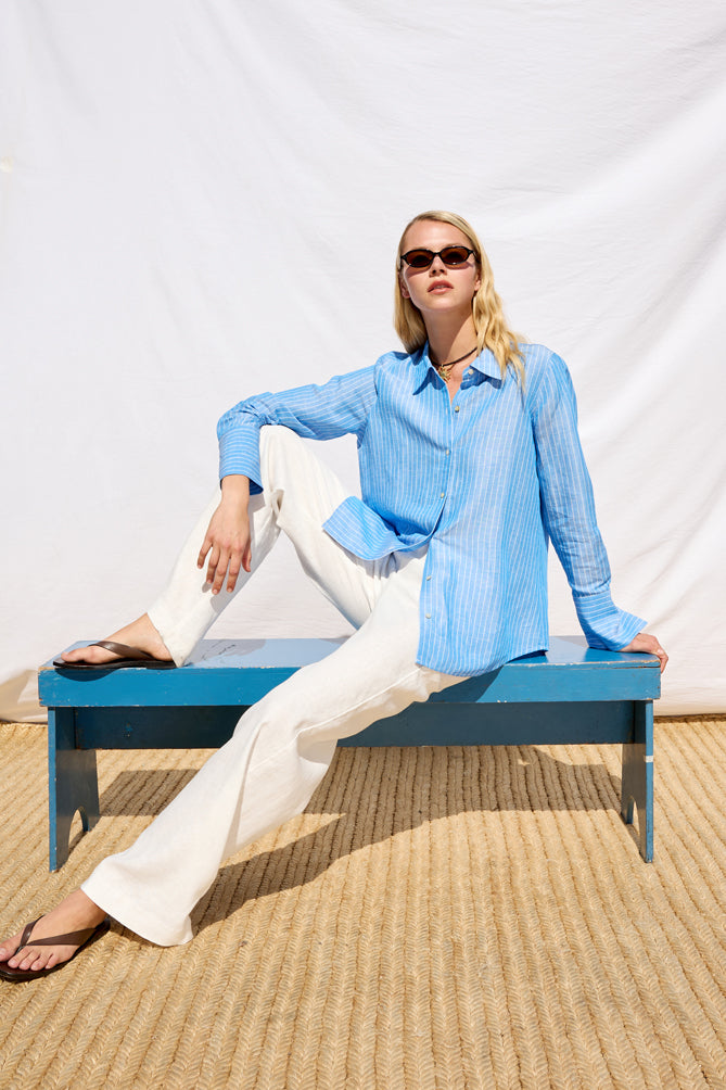 blue pinstripe linen shirt with shiny buttons from rails model shot