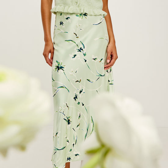 mint mid length silky slip skirt with elasticated waist and floral print form rails  model shot