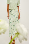 mint mid length silky slip skirt with elasticated waist and floral print form rails  model shot