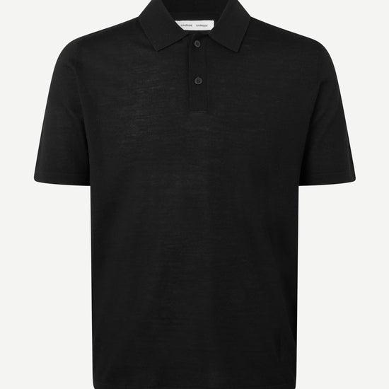 Black extra fine merino wool polo shirt on a white background from Samsoe Samsoe