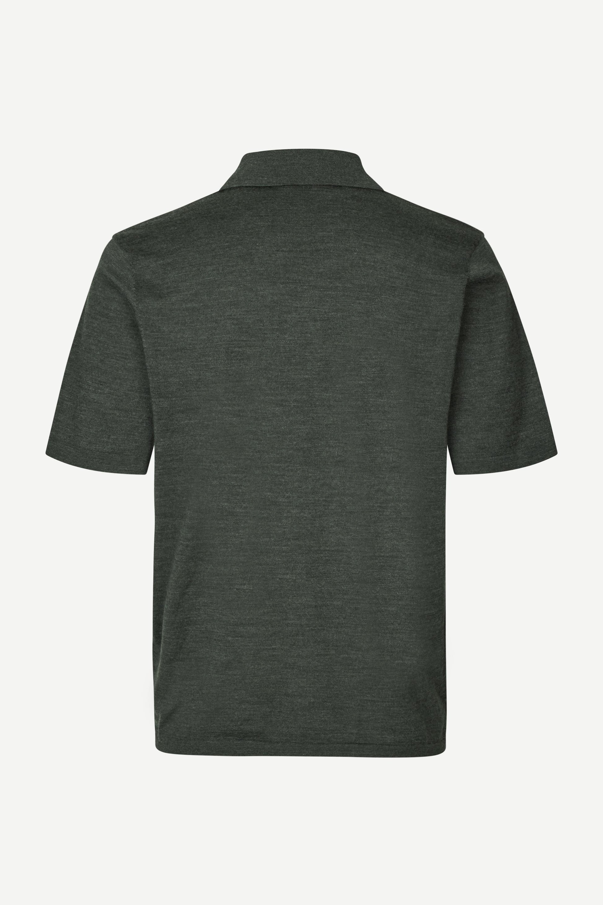 Dark green polo shirt on a white background