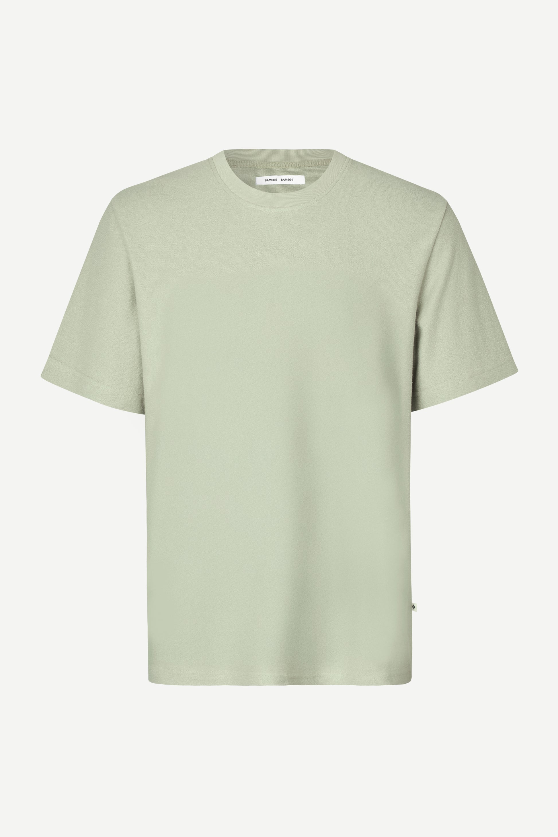 Light green t-shirt on a white background