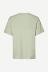 Light green t-shirt on a white background