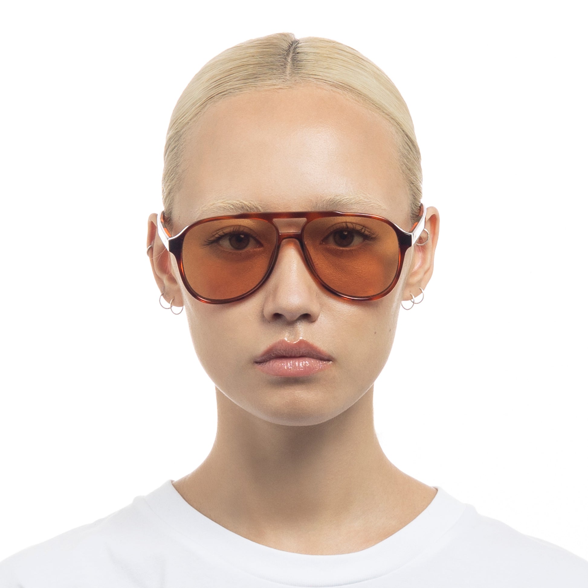 Tortoise shell Le Specs sunglasses on a female model