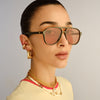 Dark Olive Le Specs sunglasses on a female model