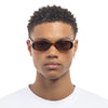 tortoise shell Le Specs sunglasses on a made model front view