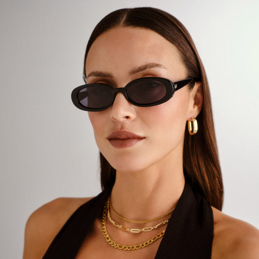 Black Le Specs Sunglasses on a female model front view
