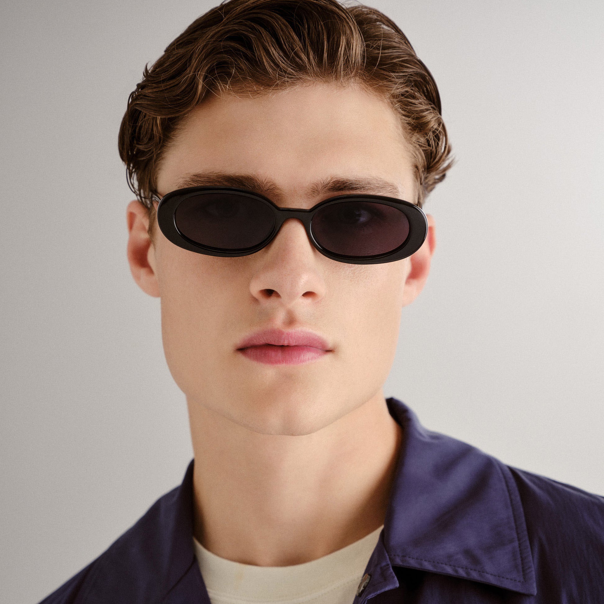Black Le Specs Sunglasses on a male model front view