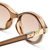 brown Le Specs sunglasses on a white background close up