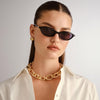 black Le Specs sunglasses on a female model