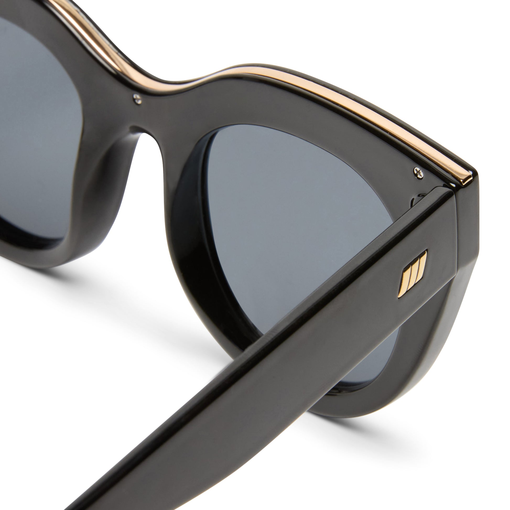 black Le Specs sunglasses on a white background close up