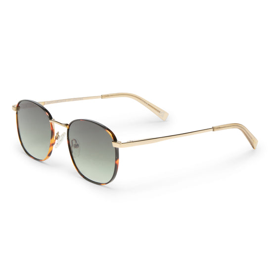 Tortoise shell and gold Le Specs sunglasses on a white background side view
