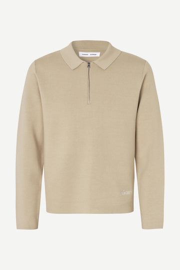 beige quater zip long sleeve polo knit on white background