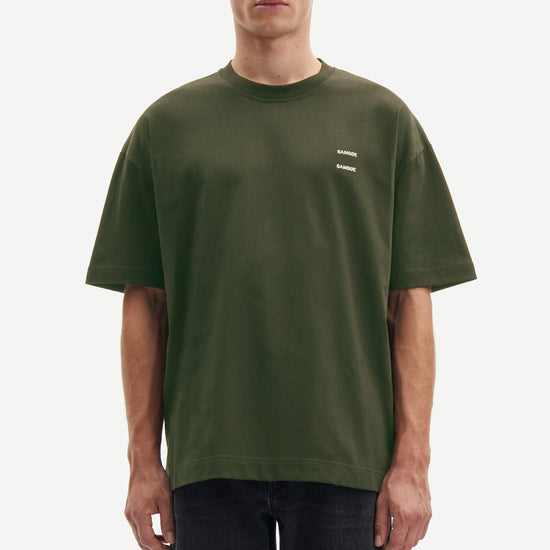 forest green t shirt with Samsoe branding on a model