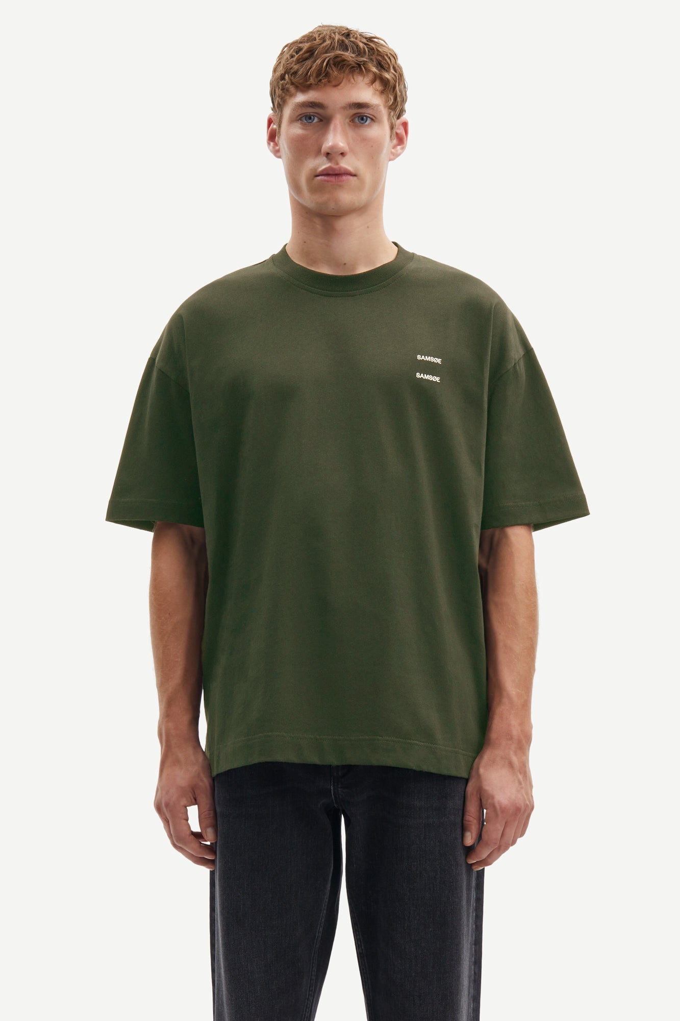 forest green t shirt with Samsoe branding on a model