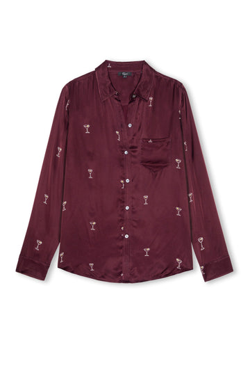 A long-sleeve button-up shirt in deep burgundy with a repeating small white cocktail glass pattern, displayed flat against a white background.