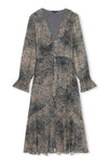 ditsy print blue dress with long sleeves and a ruffle hem