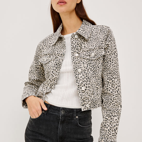 women wearing leopard print jacket with black denim