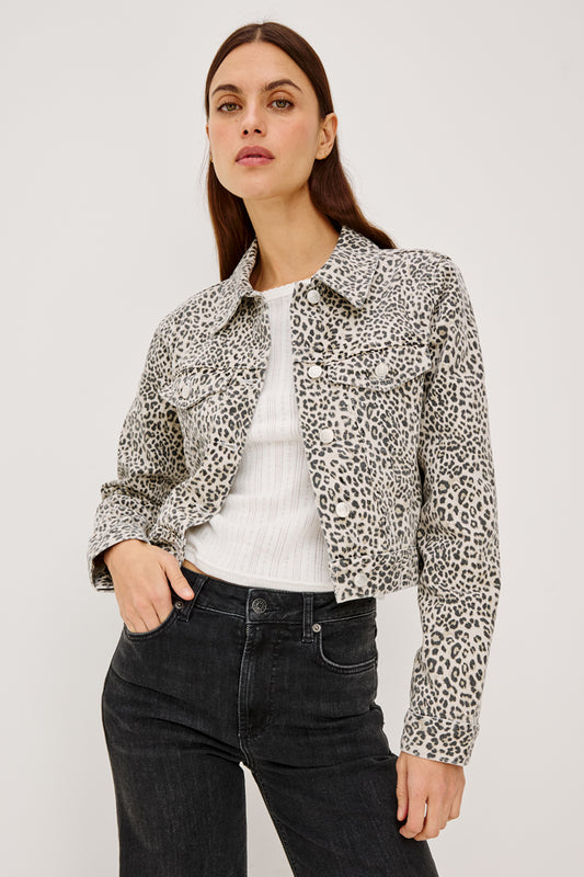 women wearing leopard print jacket with black denim