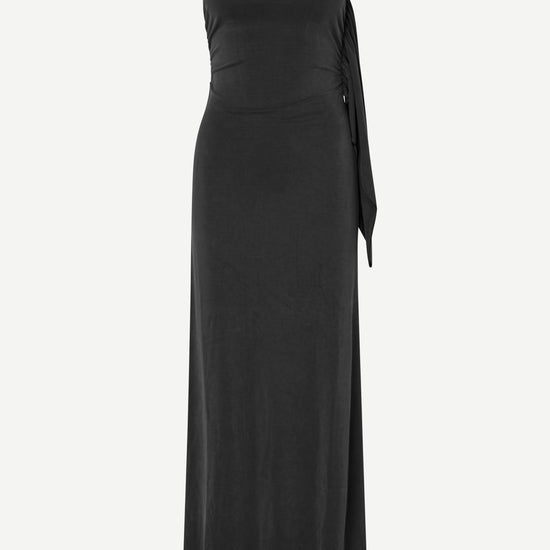 A black strapless maxi dress with a ruched waist and a side tie detail, shown against a plain light gray background.