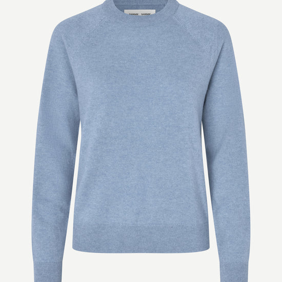 Blue sweater on a white background