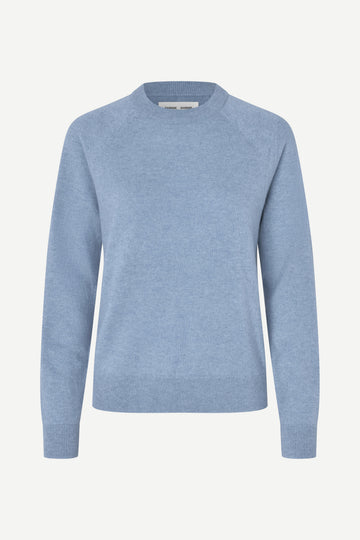 Blue sweater on a white background