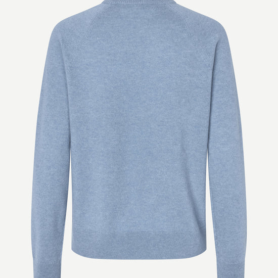 Light blue sweater on a white background
