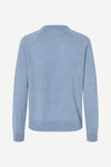 Light blue sweater on a white background