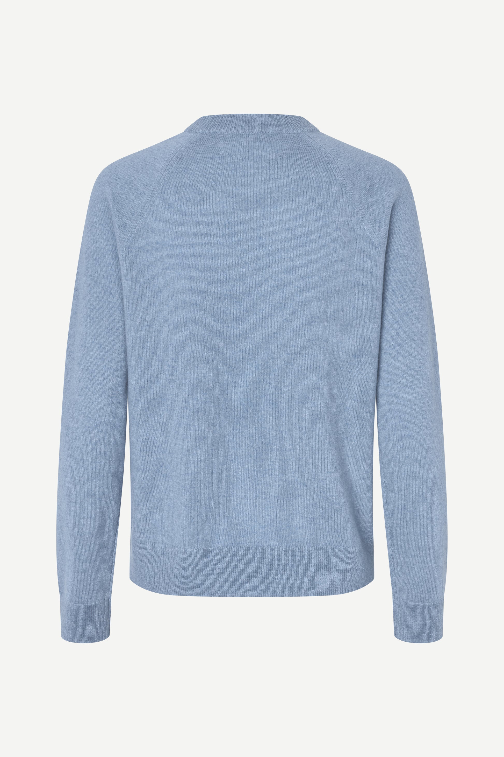 Light blue sweater on a white background