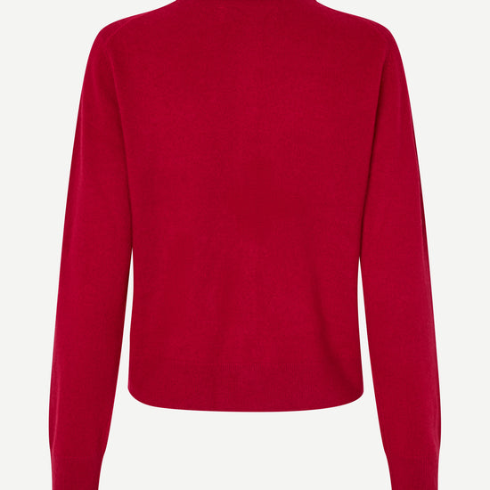 Red sweater on a white background