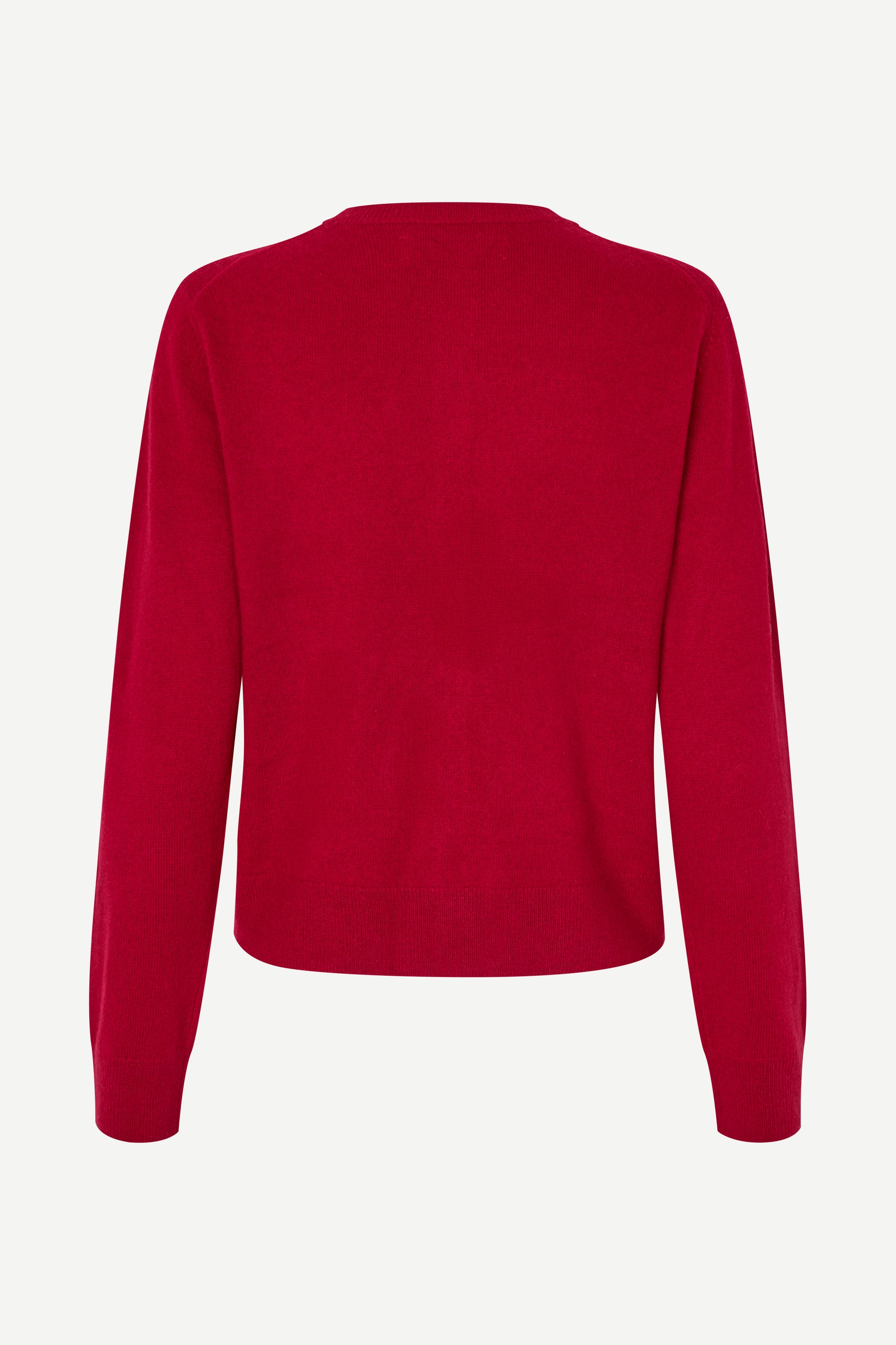 Red sweater on a white background