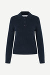 A dark navy blue knit polo sweater with a three-button placket, displayed on a clean, light gray background.
