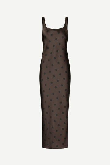 A dark brown sleeveless slip dress with a black polka dot pattern, shown against a plain light gray background.