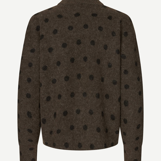 A dark brown knit cardigan with a black polka dot pattern, shown from the back on a plain white background.