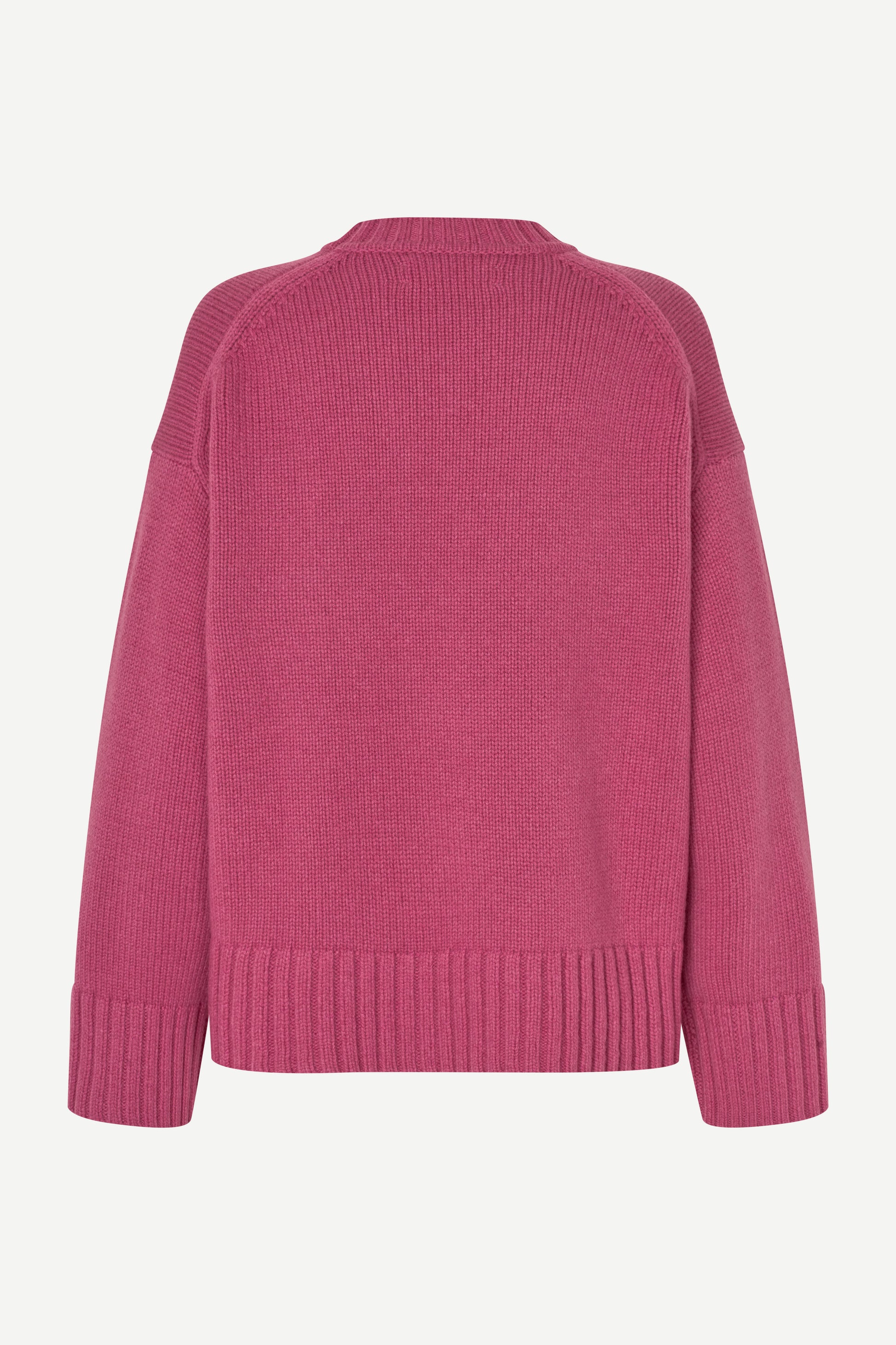 A pink knit sweater shown from the back, featuring a crew neck, raglan sleeves, and ribbed cuffs and hem, displayed on a clean white background.