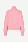 A light pink knit sweater with a mock neck and long sleeves, shown from the back on a clean, light off-white background.