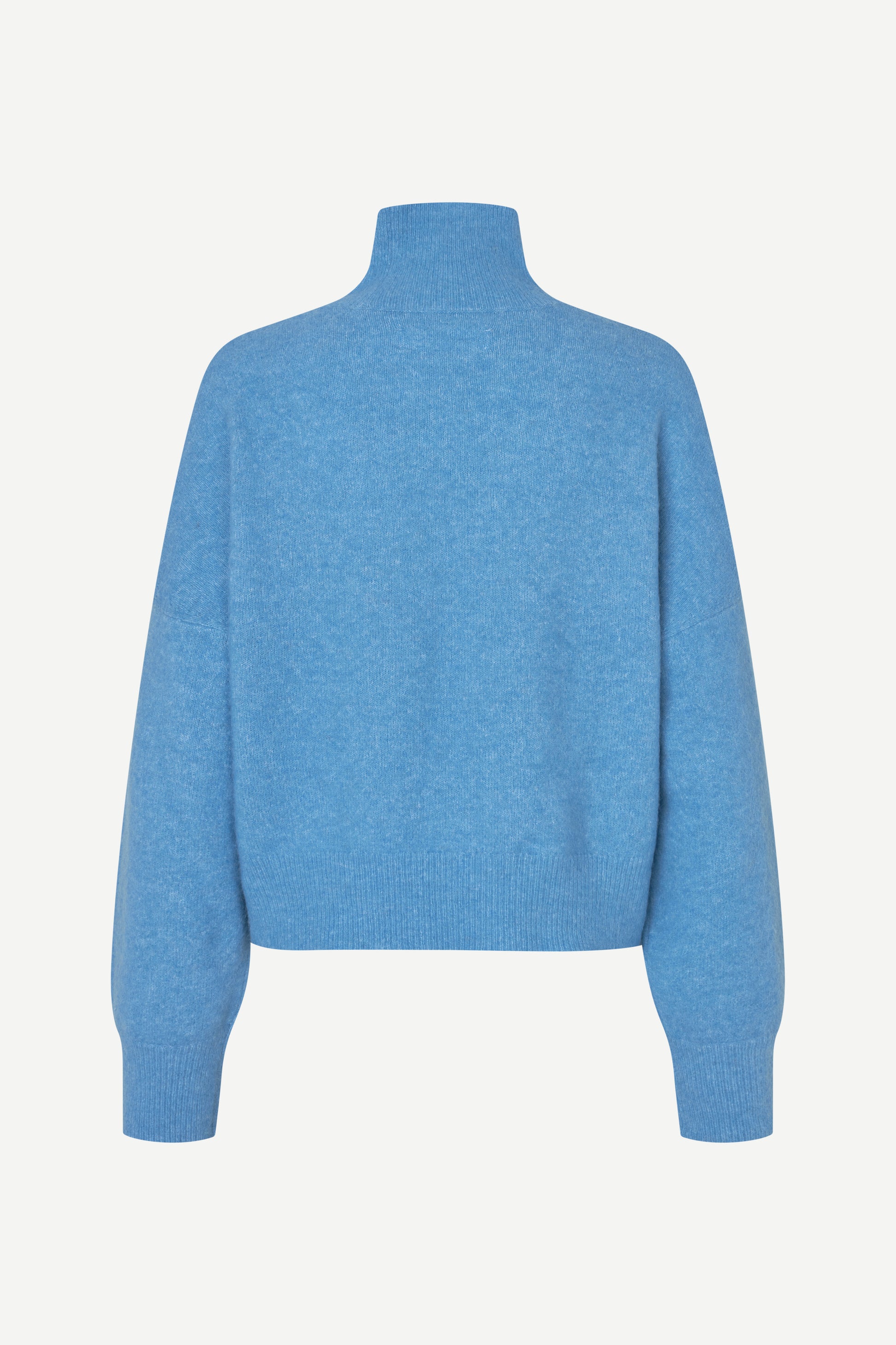 A light blue knit mock neck sweater shown from the back, featuring long sleeves and ribbed cuffs and hem, set against a plain off-white background.
